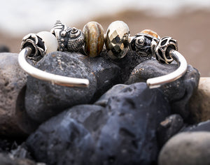 Trollbeads rævehale-armbånd armbånd med gyldne nuancer i ædelsten og glas med sølvkugler og spacers