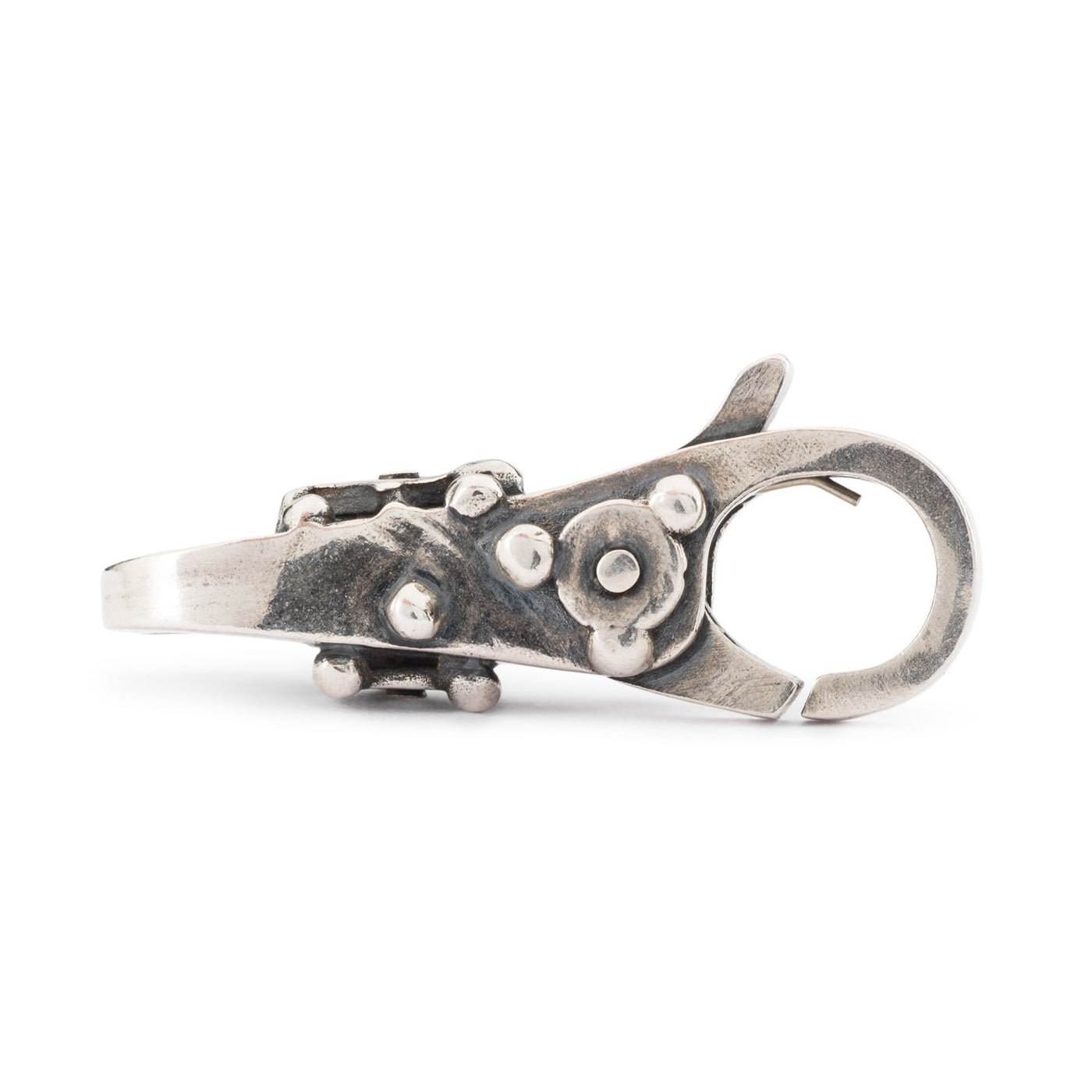 Sterlingsølv lås med små sølv-dugdråber over det hele for at sikre dit Trollbeads smykke.